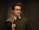 Professional Headshot of actor posing in green sweater