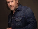Lifestyle photo of a man in a jean jacket