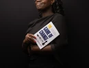 Brand photo of an author with the book she wrote