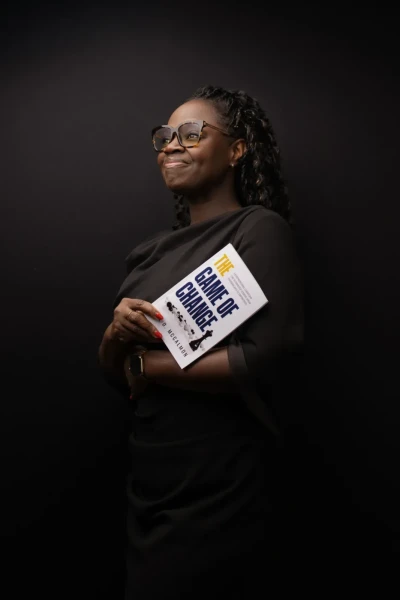 Brand photo of an author with the book she wrote