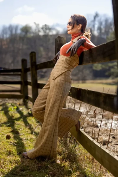 Brand photo of a woman working on a farm