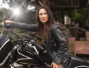 Branded image of a woman on a motorcycle 
