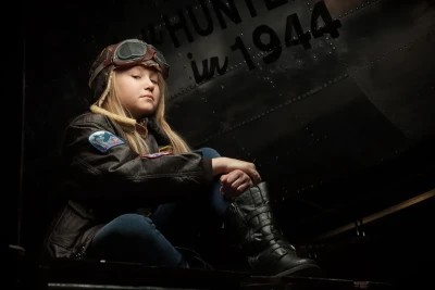 Lifestyle photo of a child with an airplane