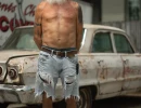 Lifestyle image of a man in front of a car