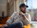 Professional Headshot of man sitting in a shop
