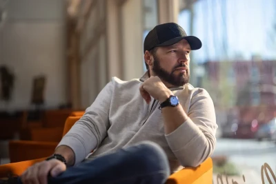 Professional Headshot of man sitting in a shop