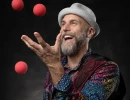 Lifestyle image of a man juggling