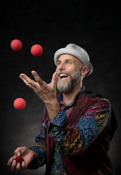Lifestyle image of a man juggling