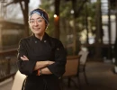 Professional Headshot of a chef posing at a restaurant 