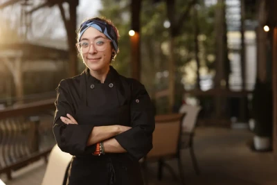 Professional Headshot of a chef posing at a restaurant 
