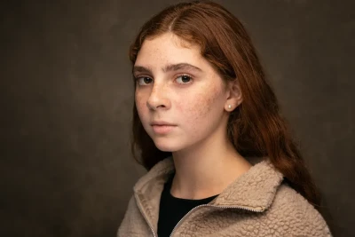 Professional Headshot of woman posing in the studio
