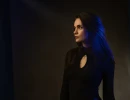 Professional Headshot of woman posing in the studio with blue lighting