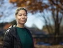 Professional Headshot of woman posing outside in fall