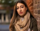 Professional Headshot of woman posing outside in fall