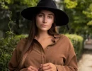 Professional Headshot of woman posing outside in fall