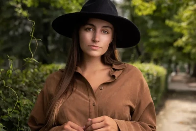 Professional Headshot of woman posing outside in fall