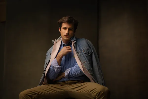 Portrait of an actor in studio wearing a denim jacket